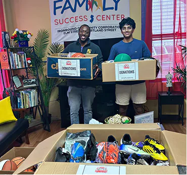 A trunk full of donated gear bags — distribution partners